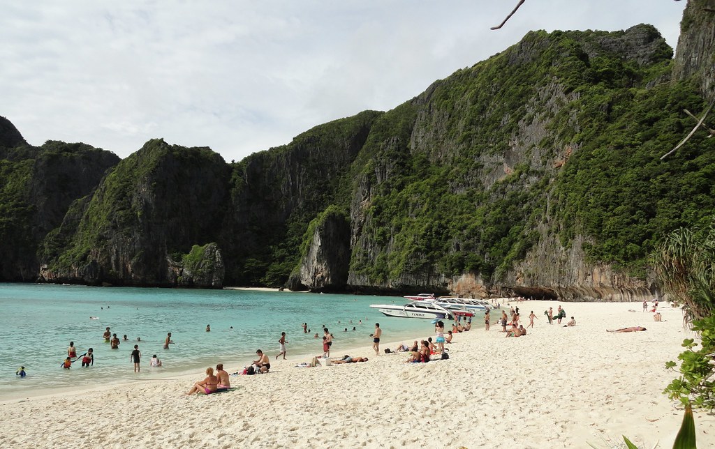 White sand and limestone cliffs at a beach on a day trip from Phuket